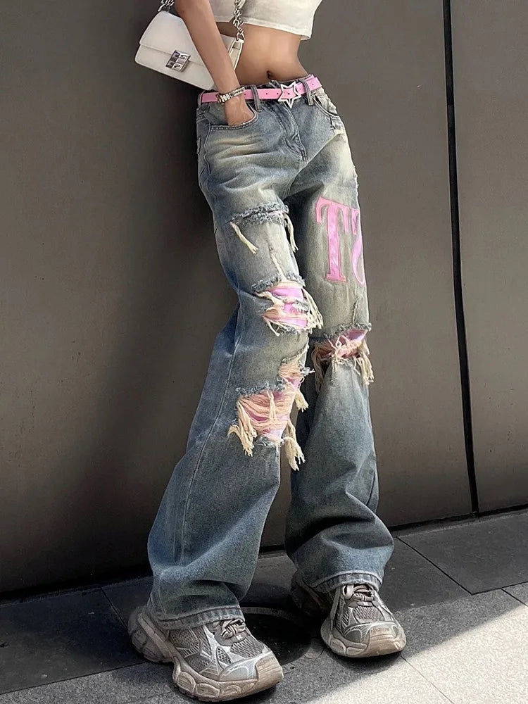 Vintage Pink Ripped Jeans