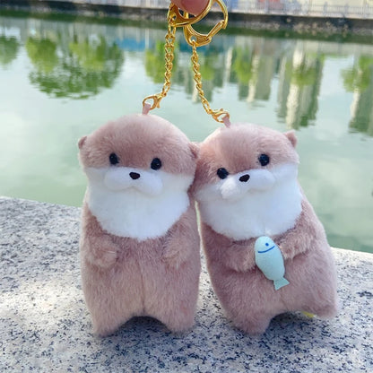 Otter Holding Fish Plush Keyring