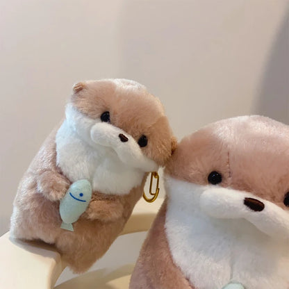 Otter Holding Fish Plush Keyring